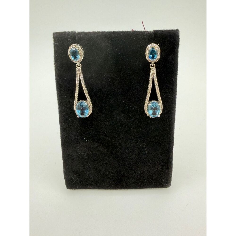 Blue topaz‎ and cz accent dangle earrings in sterling silver!